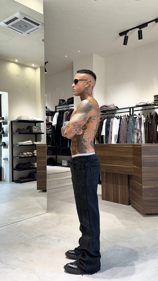 BOOTCUT SPALMATO JEANS