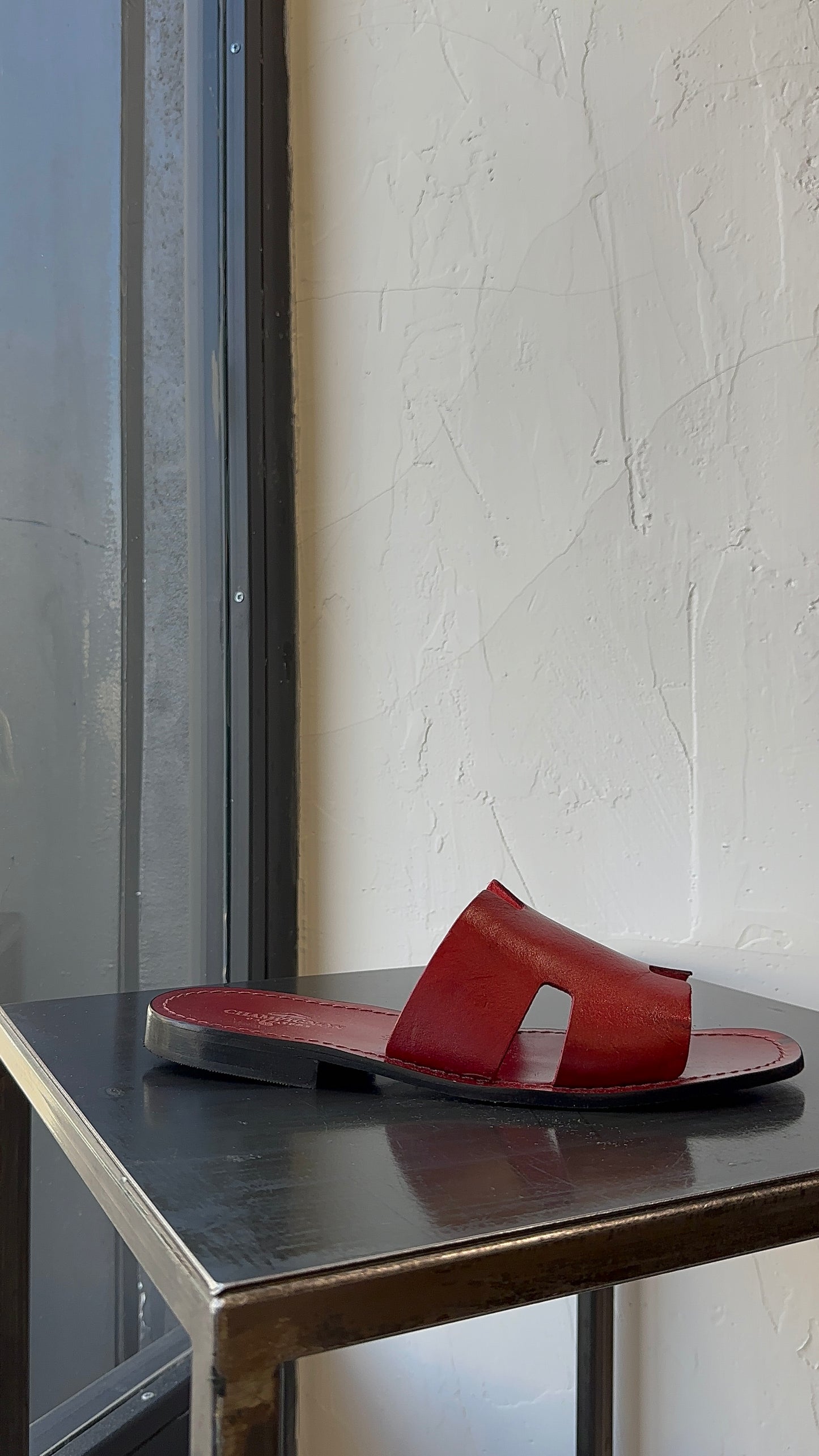 HER SANDAL