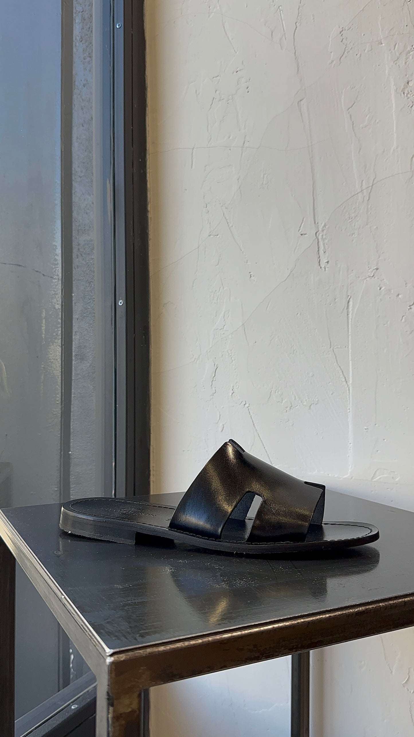 HER SANDAL
