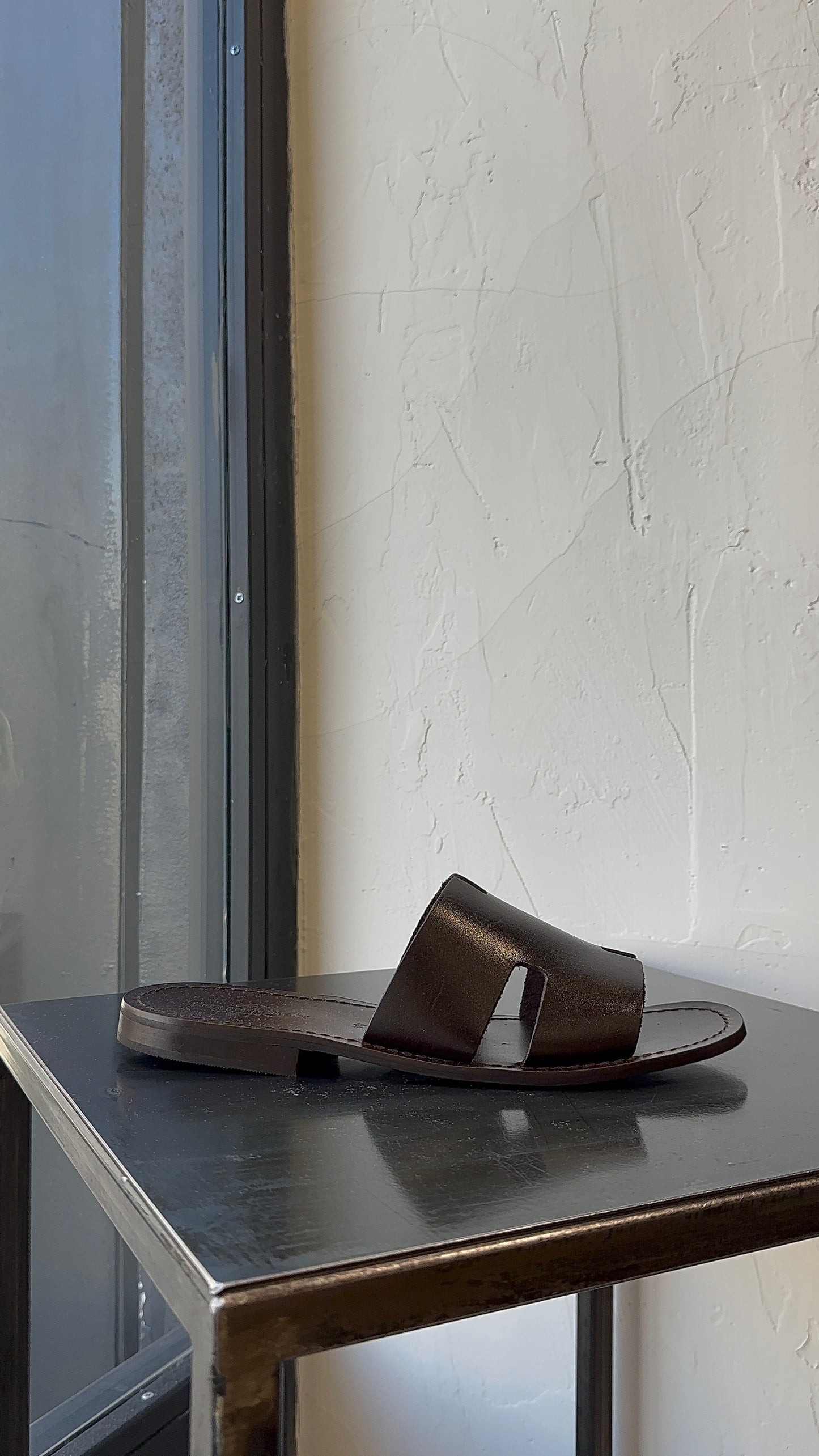HER SANDAL