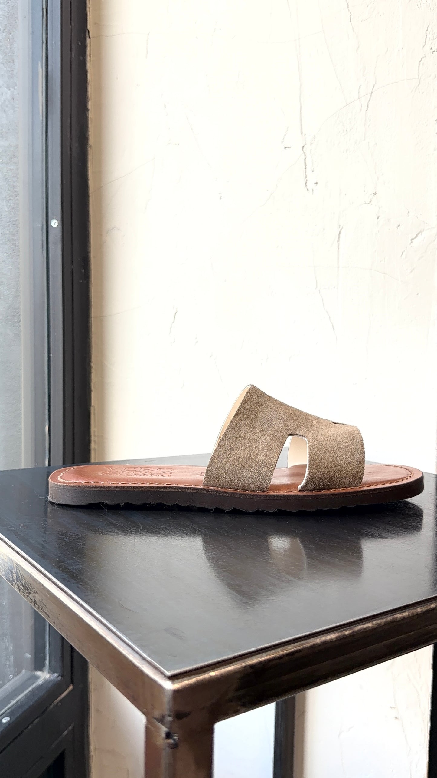 HER SANDAL