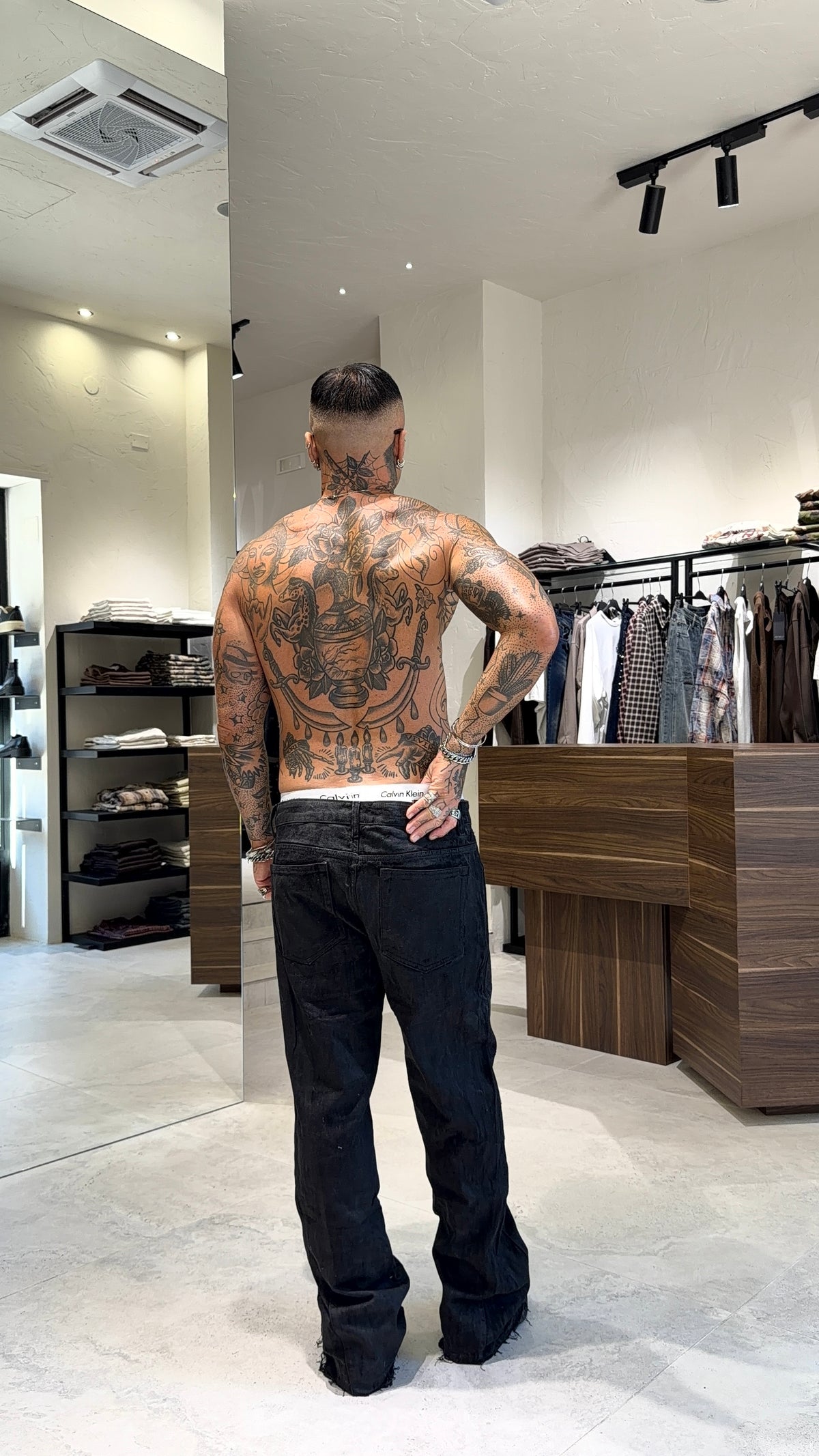 BOOTCUT SPALMATO JEANS