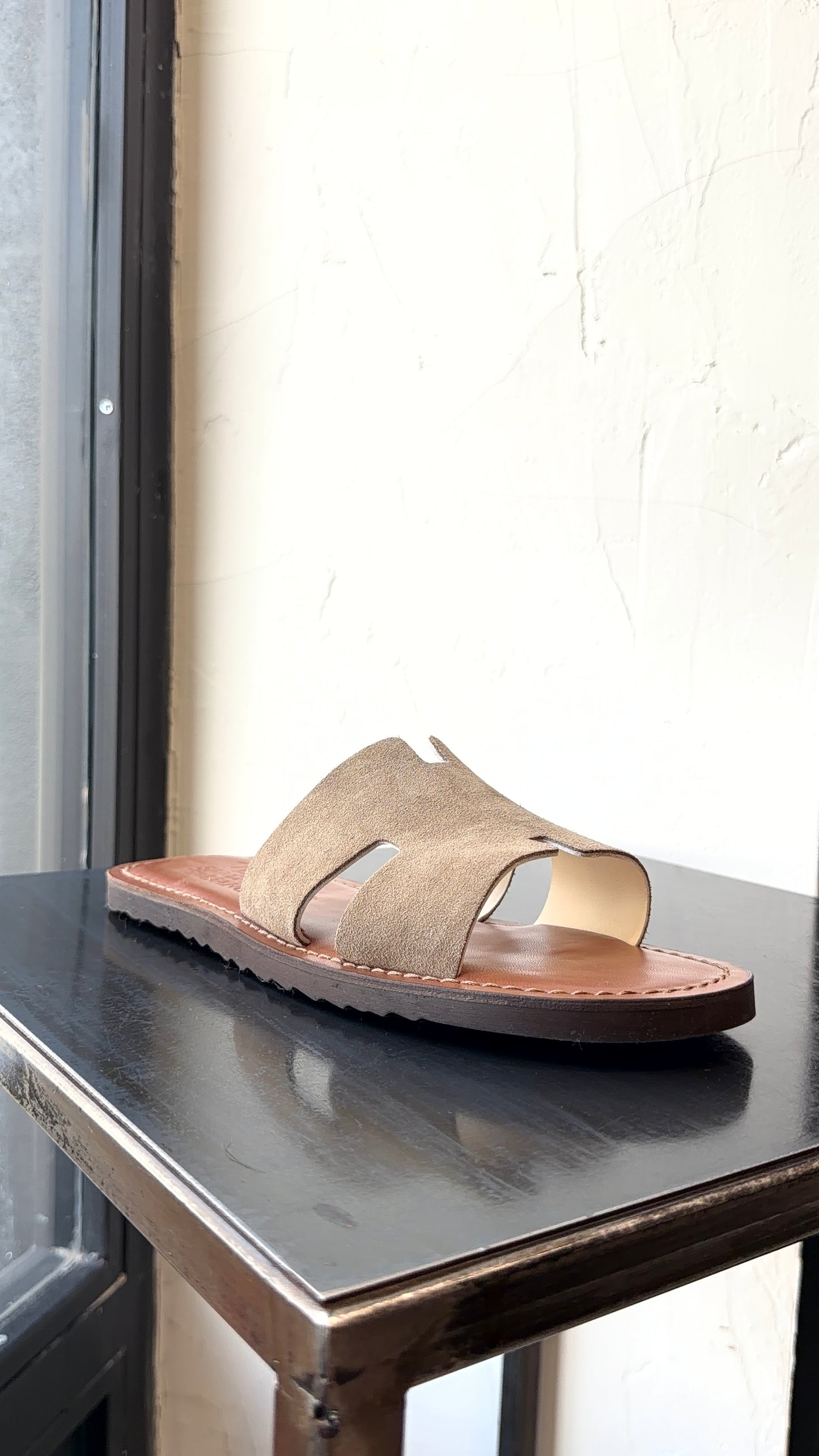HER SANDAL