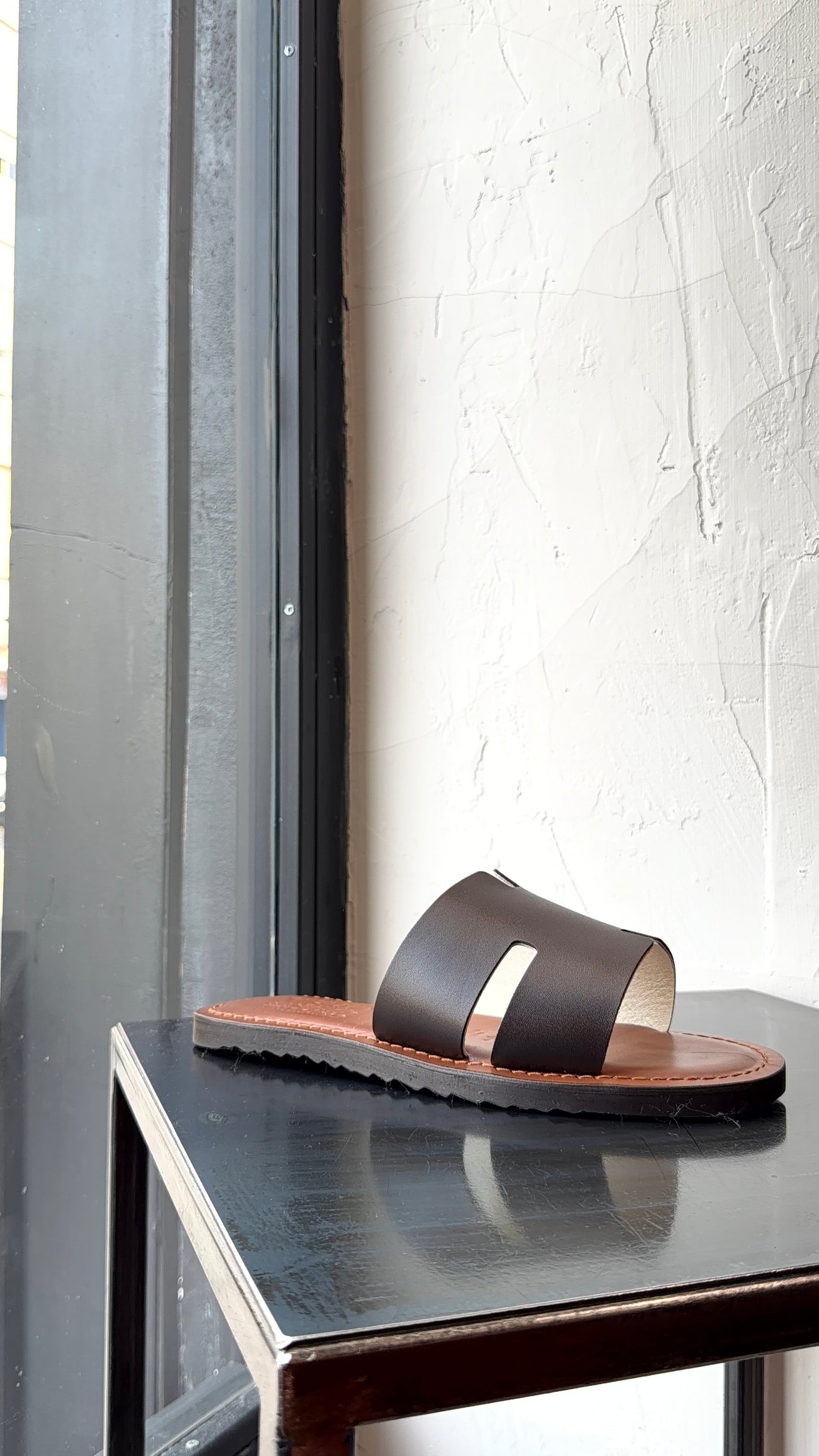 HER SANDAL